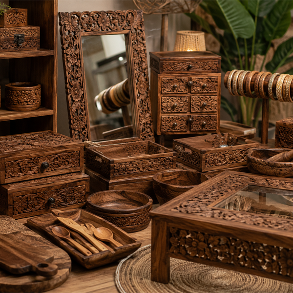 Skilled Indian artisan detailed carving on a wooden mirror frame